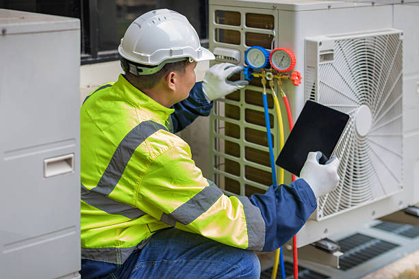 Professional Air Conditioning Repair technician working in Brownsville, KY